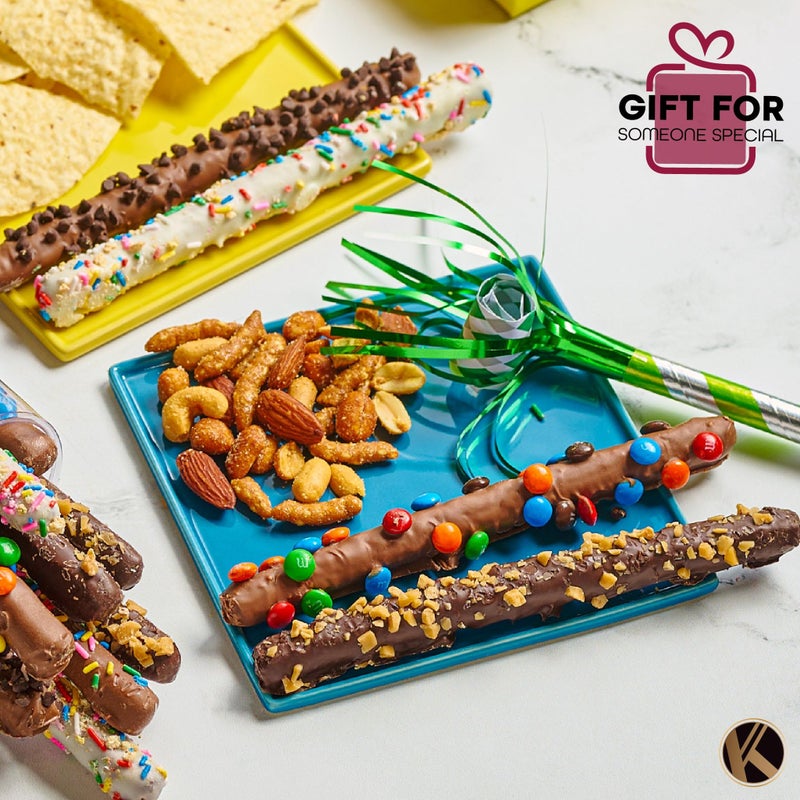 Nut Cravings KREMERY Creamy Chocolate Cravings - Halloween Treats For Adults Chocolate Covered Pretzel Rods Gift Basket, in Clear Tube (8 Pretzels, Assorted Sweet Toppings) Holiday Xmas Christmas Food Arrangement - Image 2